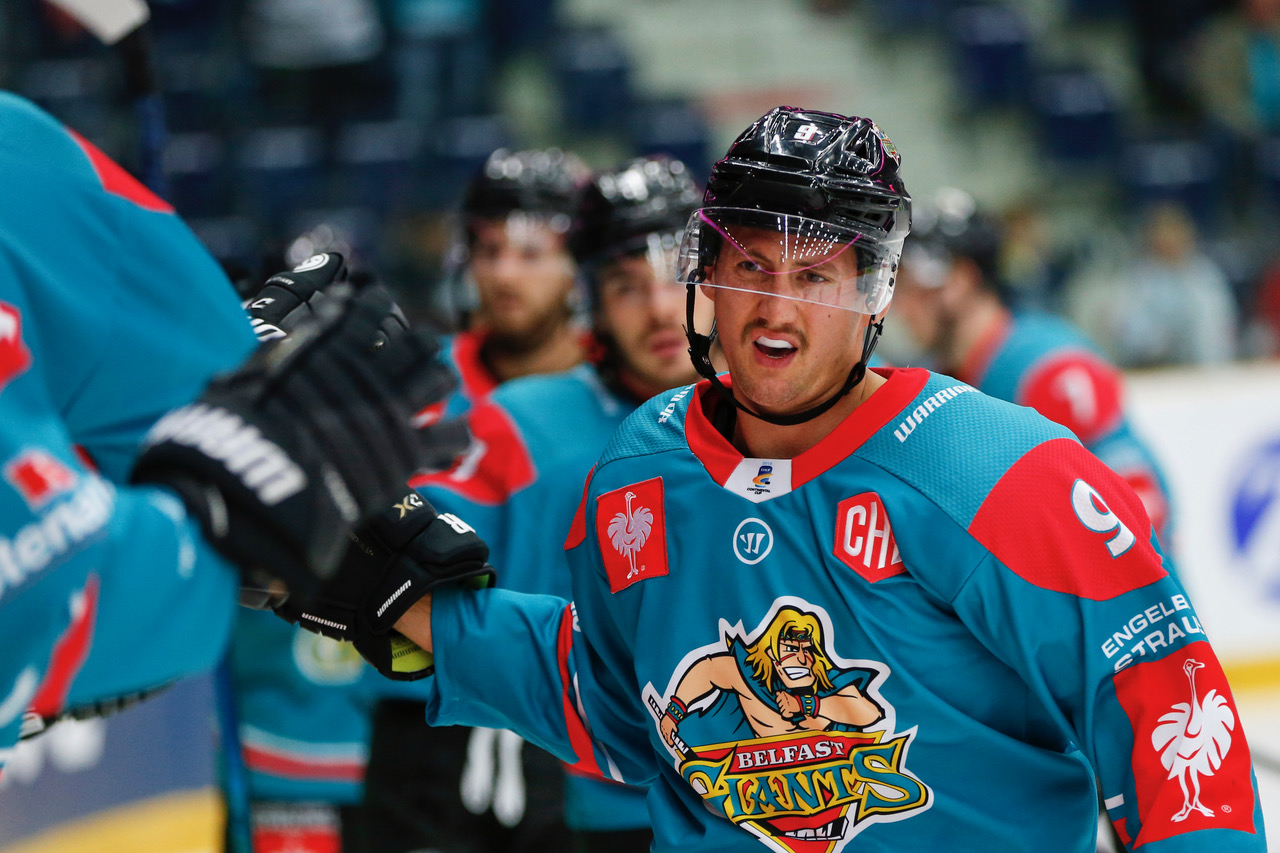 Giant Ben Lake #9 celebrates his goal with team